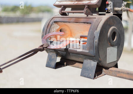 Detail of red hot horseshoes in a stove Stock Photo