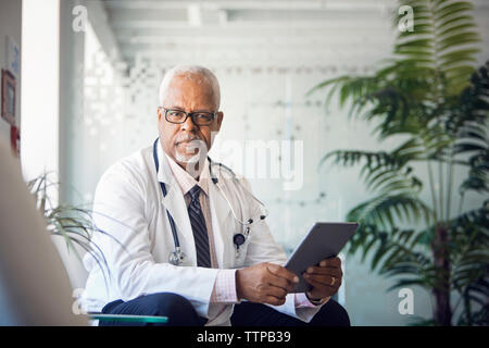Portrait of doctor with tablet computer in hospital Stock Photo