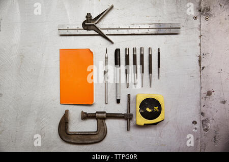 Overhead view of tools on table Stock Photo