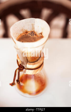 High angle view of coffee filter and container on table Stock Photo