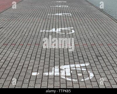Detailed view on different symbols and lines painted on german streets Stock Photo