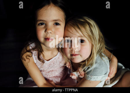 High angle portrait of sisters at home Stock Photo
