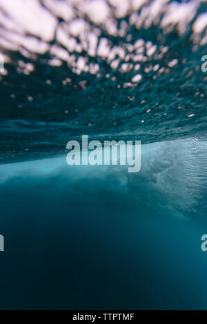 Low angle view of waves breaking undersea at Maldives Stock Photo
