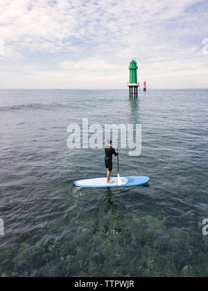 Aerial view of stand up paddle surfing Stock Photo