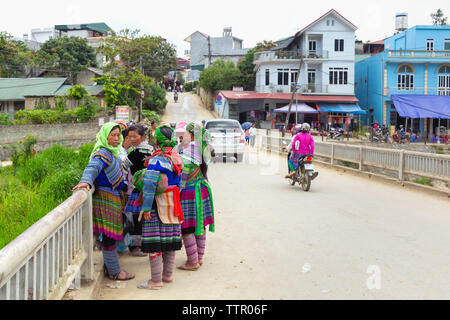 Group of Flower Hmong ethnic Minority women, Bac Ha, Lao Cai Province, Vietnam, Asia, Stock Photo