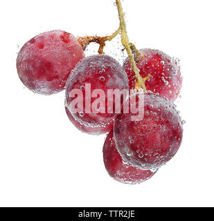 Grapes in a water on white background Stock Photo