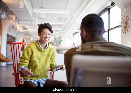 Entrepreneurs discussing in office Stock Photo