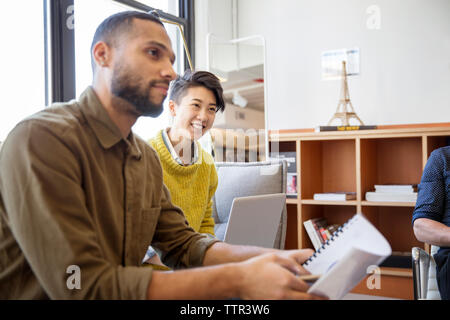 Entrepreneurs brainstorming at office Stock Photo