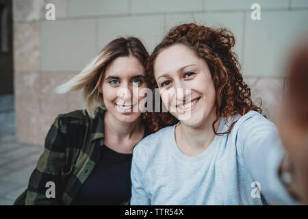 Two young women taking a selfie together Stock Photo