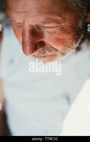 High angle view of man sitting at barber shop Stock Photo