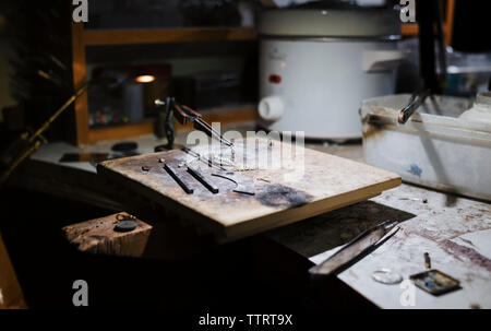 High angle view of equipment on workbench Stock Photo