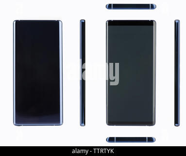 Modern dark blue smartphone with big screen isolated on white background Stock Photo
