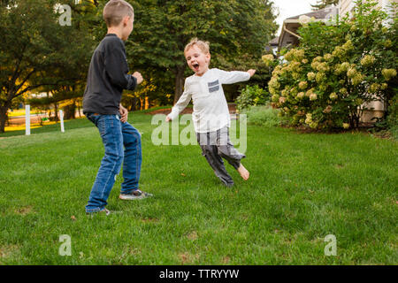 Two brothers play outdoors in autumn, best friends. Two happy boys Stock  Photo - Alamy