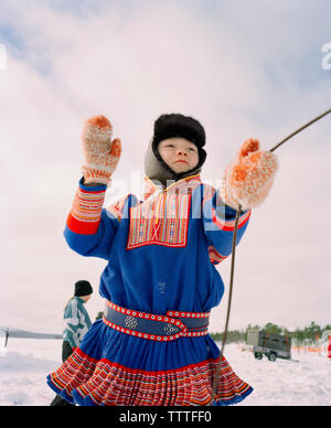 FINLAND, Hemet, Arctic, a Sami boy wearing the traditional Sami outfit during a Sami Festival in Hemet. Stock Photo