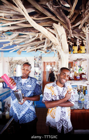 JAMAICA, Oracabessa. Goldeneye hotel and Resort. Bartender making a drink at the bar. Stock Photo