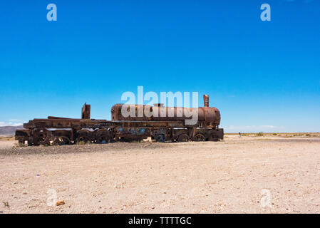 Antique train cemetery on the desert, Uyuni, Potosi Department, Bolivia Stock Photo