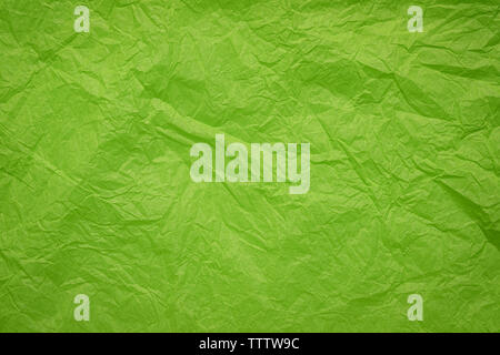 grunge, crumpled, wrinkled and creased green paper background Stock Photo