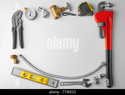 Plumber tools frame isolated on white Stock Photo