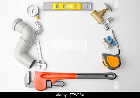 Plumber tools frame isolated on white Stock Photo