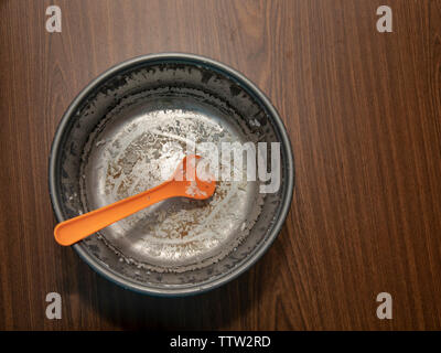 Old electric rice cooker with ladle Stock Photo