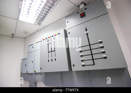 Electric Control Electrical Fuseboxes and Power Lines Switchers in the building Stock Photo
