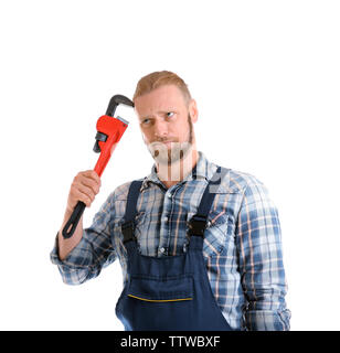 Portrait of funny plumber with pipe wrench isolated on white Stock Photo