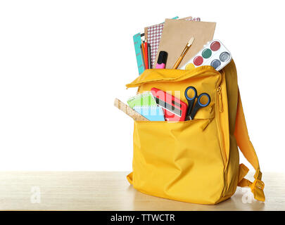 Yellow school backpack isolated on white Stock Photo