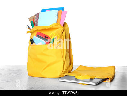 Yellow school backpack isolated on white Stock Photo