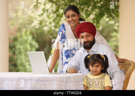 Portrait of a sardar family at a patio Stock Photo