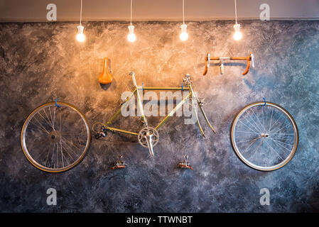 Decorate in living room with Bicycle on the wall. Interior Design. hobby for healthy lifestyle person in the city. cycling in the park. Stock Photo