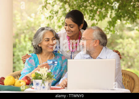 Family shopping with credit card Stock Photo