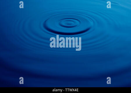 Concentric circles on water surface Stock Photo