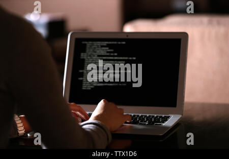 Woman working with laptop in cafe Stock Photo