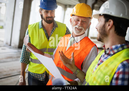 Group of construction engineer working in construction site Stock Photo