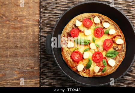 Freshly baked pizza in a pan Stock Photo