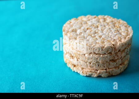 Rice crackers on blue background Stock Photo