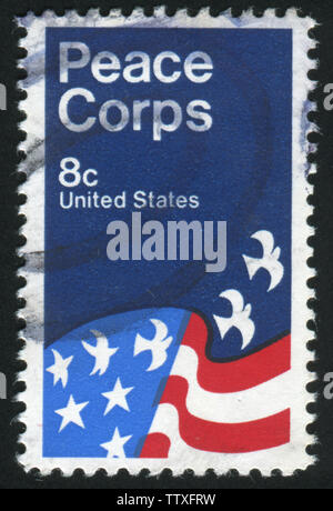 UNITED STATES - CIRCA 1971: stamp printed by United states, American Flag, Peace Corps Poster, by David Battle, circa 1971 Stock Photo