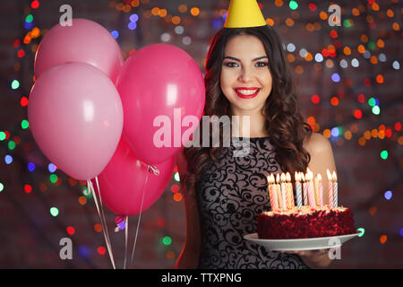 Happy Birthday. Girl With Balloons And Cake At Party Stock Photo by ©puhhha  178607894