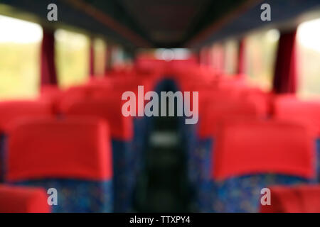 Big bus interior blurred background Stock Photo