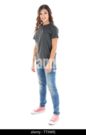 Young woman in blank grey t-shirt on white background Stock Photo