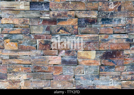 Stone brick wall decorative pattern background Stock Photo
