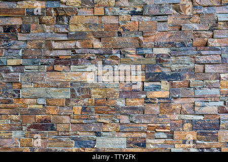 Stone brick wall decorative pattern background Stock Photo