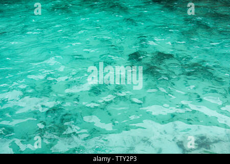 The rippled water of surface emerald sea Stock Photo