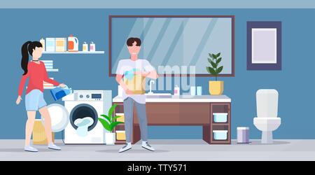 man woman with basket of clothes couple loading laundry to washing machine doing housework housekeeping concept modern bathroom interior cartoon Stock Vector