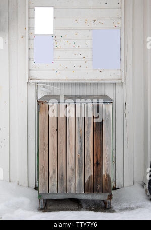 Wooden craft trash of timber on outside store in winter Stock Photo