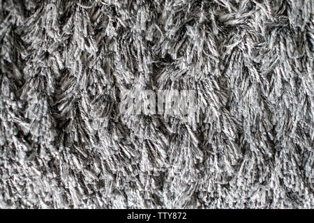 Close-up foot carpet wipes fabric fluffy velvet color Stock Photo