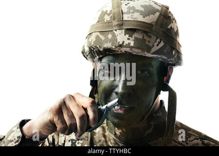 Close up view of soldier pulling safety pin out of fragmentation grenade, on white background Stock Photo