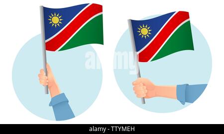 Namibia flag in hand. Patriotic background. National flag of Namibia  illustration Stock Photo