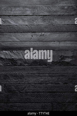 Black wood texture vertical wall background top view. Stock Photo