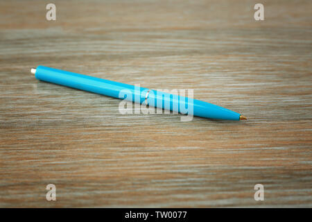 Blank ballpoint pen on wooden background Stock Photo